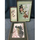 A signed painted silk painting of a peacock, mounted & framed; a feather picture of a bird on floral