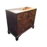 A Georgian mahogany chest of drawers, the rectangular moulded top above two short and two long