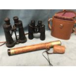 A wartime telescope with leather mounts; a pair of Barr & Stroud forces binoculars; and a leather