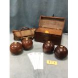 A boxed pair of hardwood bowls dated 1951; and another canvas cased pair by Thomas Royce of