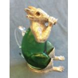 A green glass decanter with silver plated mounts modelled as a squirrel, the hinged head with