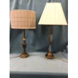 A Victorian style brass tablelamp with leaf cast column on pierced base, mounted with tweed shade;