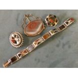 Four pieces of Victorian Scottish polished agate jewellery - a silver bangle with rectangular