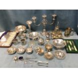 Miscellaneous silver plate - a candelabra, bowls, sugar nips, cased servers, a rose bowl, an egg