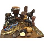 Miscellaneous carved wood items including fruit, animals, ornaments, an elephant group, painted, a
