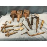 A box of miscellaneous items including three old coaching lamps, grease guns, brass barrel taps,
