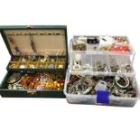 Two concertina style boxes full of jewellery - earrings, brooches, bracelets, bangles, bead