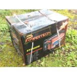 A boxed Powertech professional petrol generator, model PT6500W.