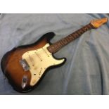 A Liberty 303 electric guitar with three pic-ups. (39.5in)