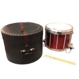 A cased pipe band snare drum by Pearl, the marching percussion instrument with aluminium frame,