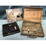 A French mahogany artists paint box with brass mounts, wood handle, colourful painters palette,