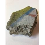 A piece of The Berlin Wall, the concrete chip with traces of painted graffiti to face. (5.75in x