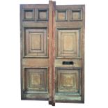 A pair of mahogany entranceway doors, formerly in the Theatre Royal Newcastle, with bollection