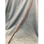 A George Schomber coachmans whip with leather thong and tapering cane shaft bound with leather
