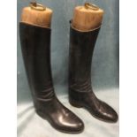 A pair of leather hunting boots with brass rings to hardwood trees - size 10?