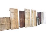 Eight pairs of nineteenth century pine panelled shutters - stripped, beaded, fielded panelled,