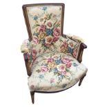 A Victorian panted & gilded armchair with rectangular upholstered back in moulded frame having