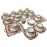 A Staffordshire 12-piece Sutherland ‘poor mans derby’ style tea set, complete with a pair of