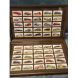 A complete set of 50 Players cigarette cards from the Motor Cars series, framed in two sets of 25,