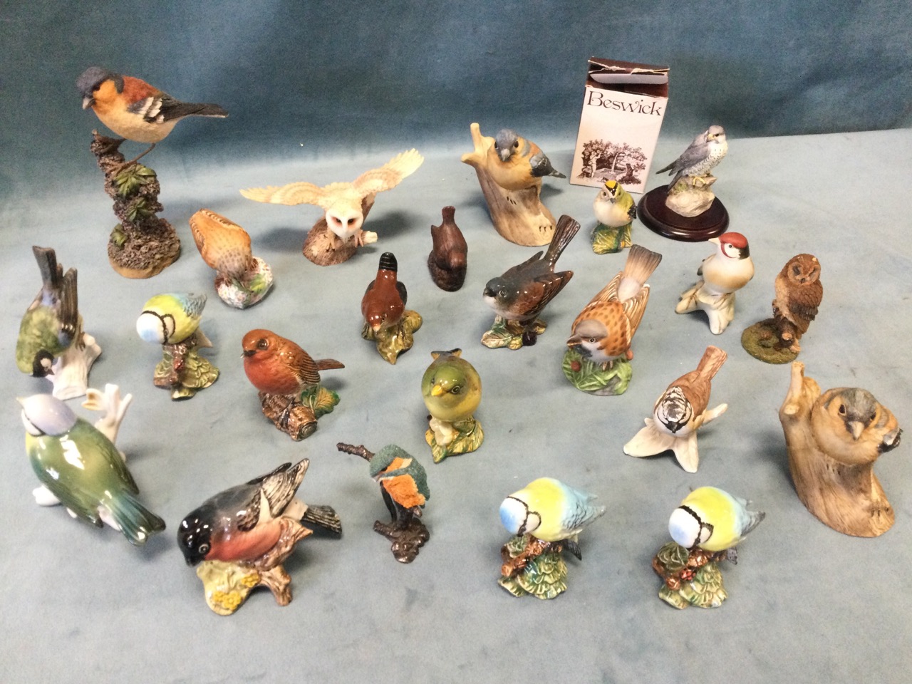 A collection of ceramic birds - Beswick, Wedgwood, resin, European porcelain, Royal Doulton, Goebel,