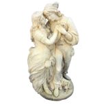 A composition stone Romeo & Juliet sculpture with loving couple around floral column, raised on