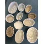 A collection of eleven miscellaneous ceramic old jelly moulds. (11)