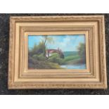 Late Victorian oil on board, cottage in water landscape, signed indistinctly, in gilt & gesso frame.