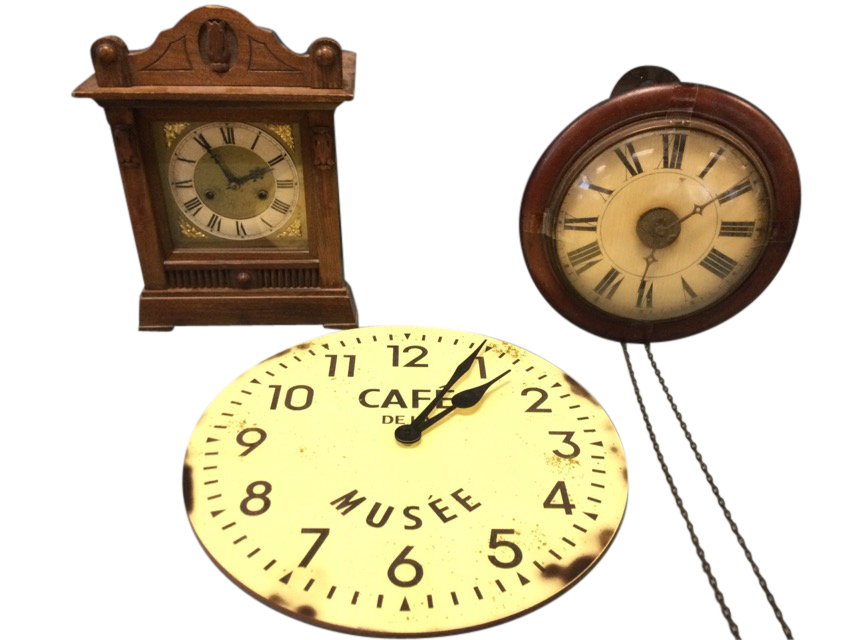 A Victorian mahogany postmans alarm clock with roman chapters under convex glass with brass bezel;