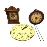 A Victorian mahogany postmans alarm clock with roman chapters under convex glass with brass bezel;