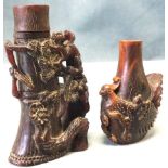 A carved horn snuff bottle & stopper in the form of a treetrunk entwined with blossom foliage; and