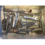 Miscellaneous old tools including spanners, a copper soldering iron, sockets, callipers, drill bits,