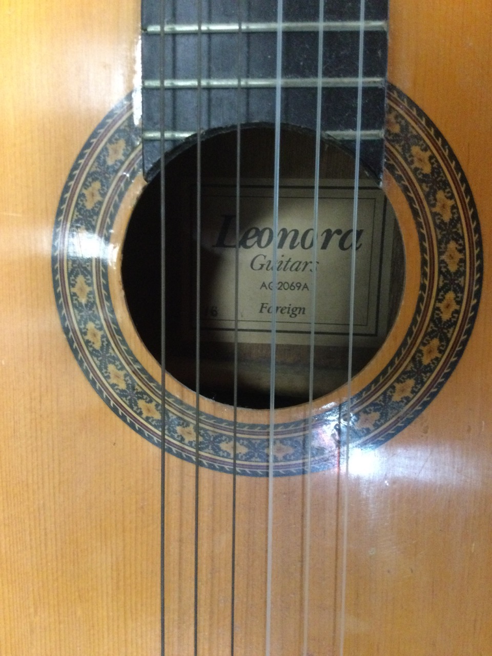 A Leonora classical nylon string guitar with cedar body, the soundhole with transfer decoration. ( - Image 2 of 3