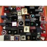 A collection of rings - mainly silver and boxed, including polished stones, faux diamond, mother-
