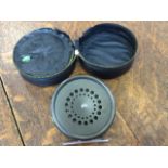 A mint Hardy perfect trout fly reel with dished drum, agate ring and rim nut adjusting screw, in