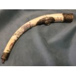An eastern tapering carved bone heroin pipe of horn shape with engraved coloured decoration of
