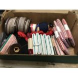 A box of upholstery gimp braid trim material, mainly on 50 metre cards, ribbons, laces, some French,