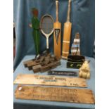 Miscellaneous items including four old planes, two cricket bats, a painted stationary rack, a carved