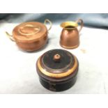 A circular Victorian toleware spice box with hinged domed cover having divisioned interior; a copper