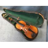 A cased violin bearing Stradivarius label. (23in)