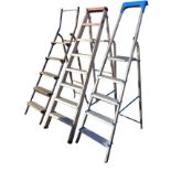 A set of new metal stepladders with four ribbed treads below work platform; another taller set