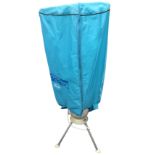 A DriBuddi electric clothes drier & cover on tripod stand with timer.