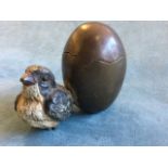 A cold painted bronze chick & egg, the bird cast beside broken egg forming a box - Geschultz