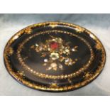 A large oval Victorian papiémaché tray inlaid with mother-of-pearl decoration painted with