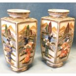 A pair of square Japanese satsuma vases embossed in relief with figural panels in landscapes, with