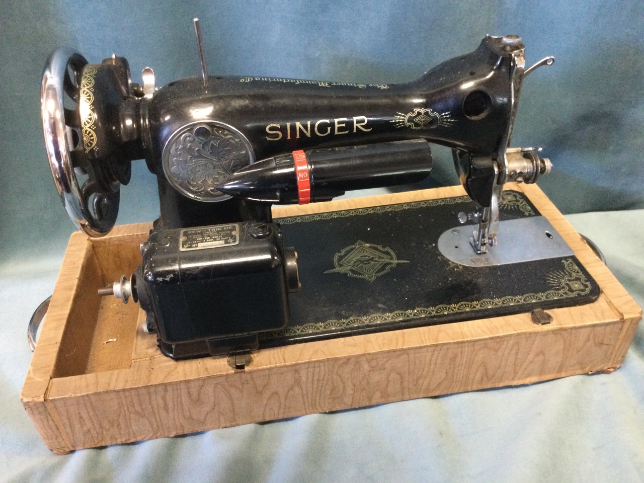 A Singer electric cast iron sewing machine, mounted on later drawer stand; and an old black bakelite - Image 2 of 3