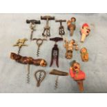 A collection of corkscrews and stoppers including a Holborn champagne screw, a Columbus with