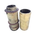 A circular stoneware chimney pot moulded with ribs - 30in; and another of plain tubular form - 24.