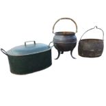 A copper cauldron shaped bin with twisted swing handle riveted with three splayed feet; an oval cast