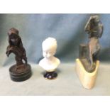 A painted art nouveau style bronze bust of a lady on circular stone base - signed; a continental