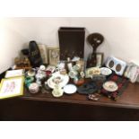 Miscellaneous items including ornaments, general ceramics, frames, a NewZealand candlestick, wood